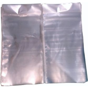 PLASTIK DUDUK OPP POLOS UKURAN 14 x 33 / PLASTIK JAJAN LEBARAN ( ISI 100 PCS )