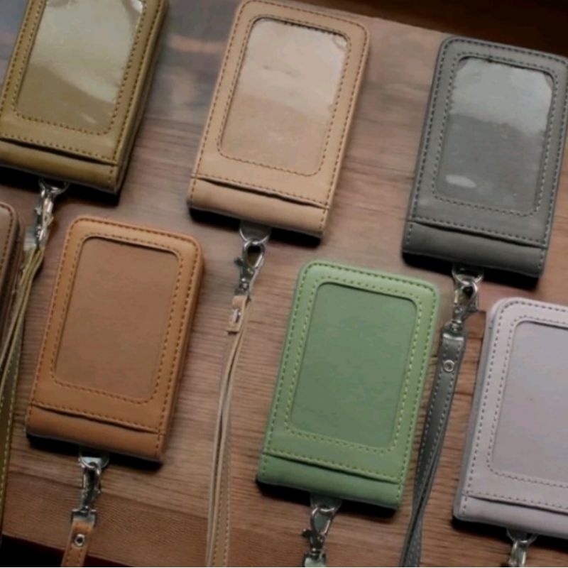 

LANYARD KULIT PASTEL DOMPET ID CARD HOLDER NAME TAG GANTUNGAN KARTU PREMIUM MURAH BERKUALITAS BEST SELLER BANJARMASIN KALIMANTAN BISA INSTAN PAKAI OJEK ONLINE | KIOS UMI