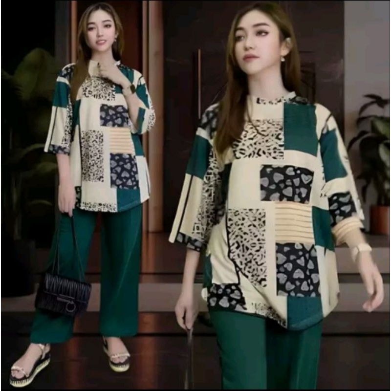 

0KAREEMA SETELAN WANITA LD 120 CELANA LURUS DAN ATASAN OVAL BELAHAN KIRI DAN