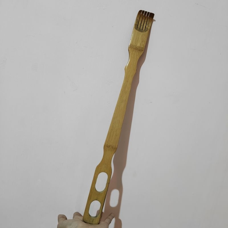 Garukan Punggung Bahan Kayu