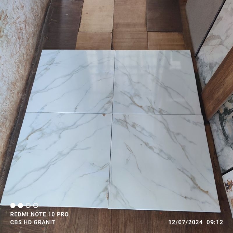 keramik lantai uk 40x40 ibiza white motip carara