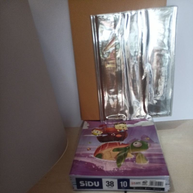 

Paketan Buku Tulis Sidu 38 Lembar isi 10 Buku + mika + Sampul coklat tebal