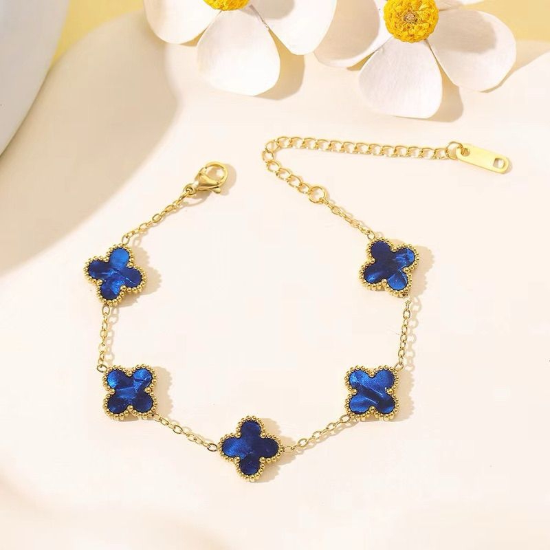 Gelang Titanium Bunga Clover Biru Bolak-balik