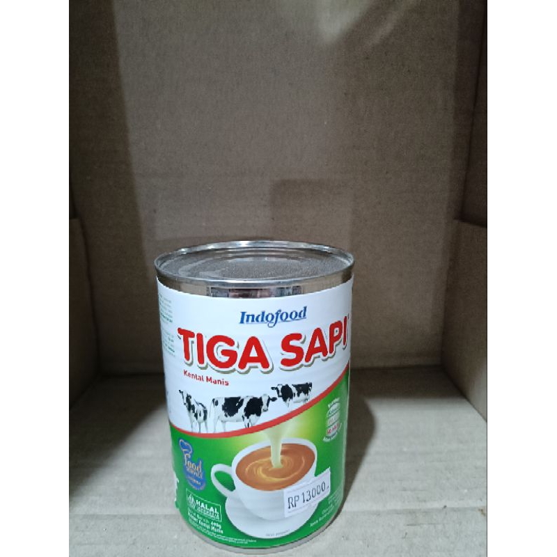 

tiga sapi susu kental manis