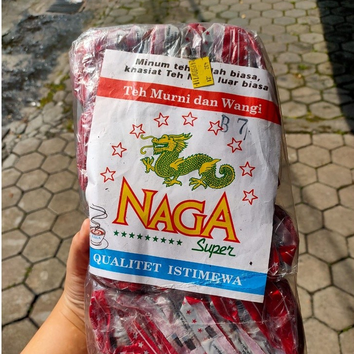 

TEH NAGA 1 BALL ISI 50 PCS -LEGENDARIS -OLEH OLEH MALANG- teh seduh khas malang