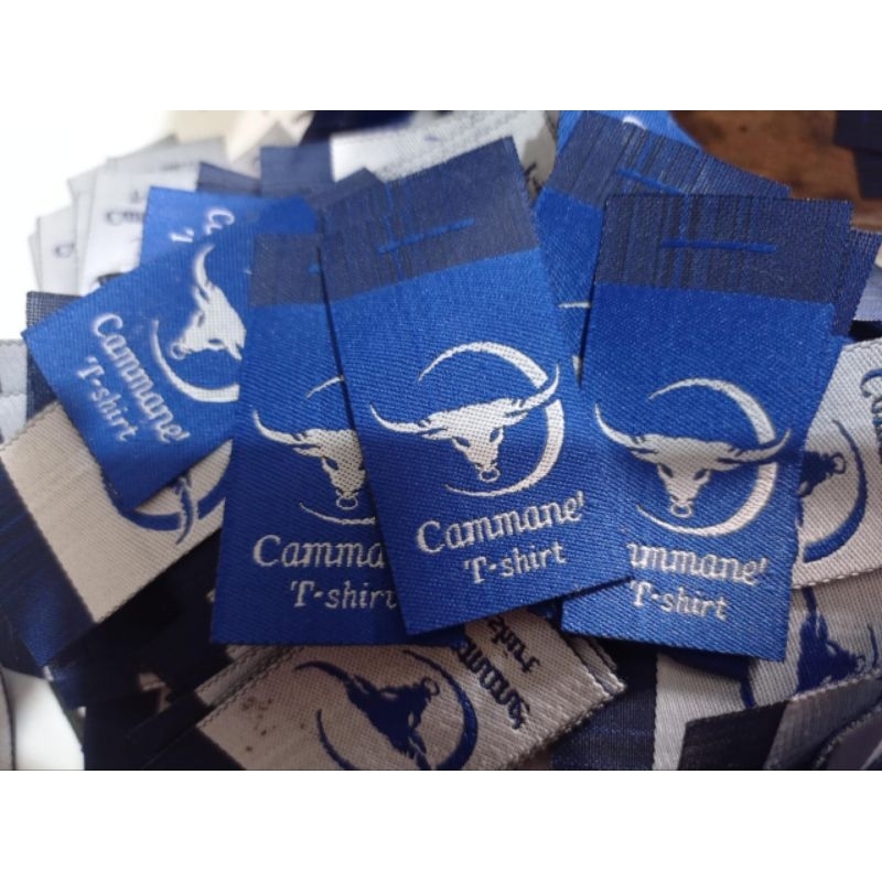 label woven bordir rajut ukuran 2,5x6cm minimal order 100 lusin(1200pcs) free dsain free hotcut/poto