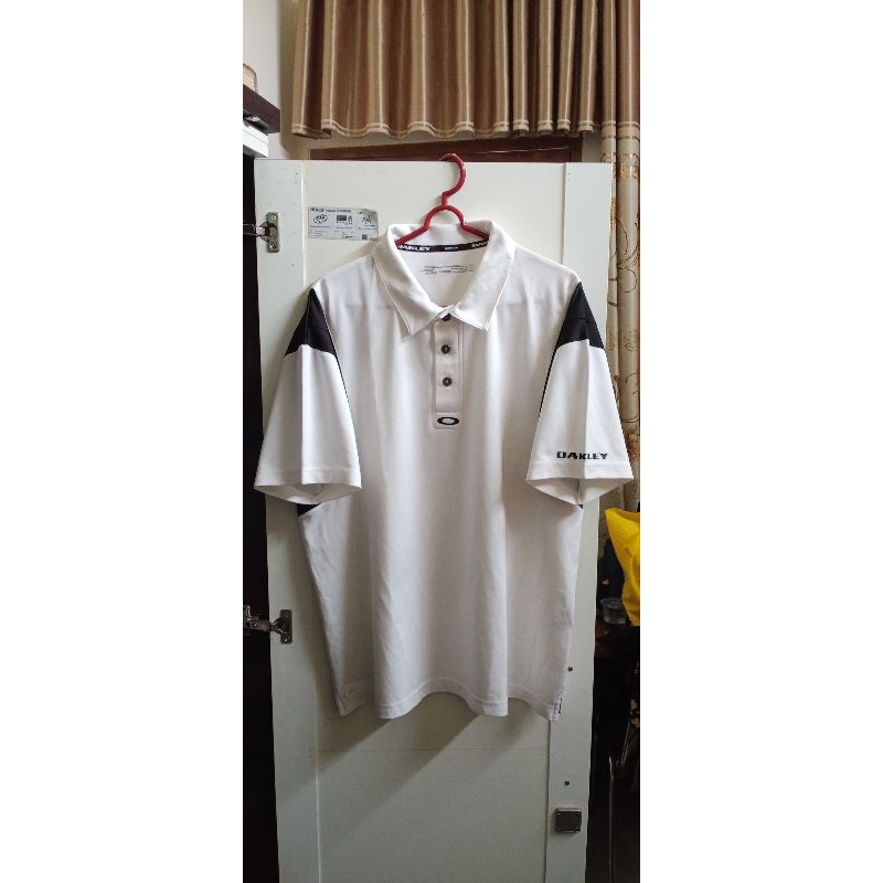 Jersey Kerah Oakley Center Logo