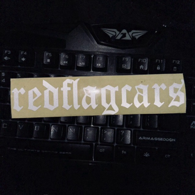 

REDFLAGCARS STICKER CUTTING 20X4,5 CM