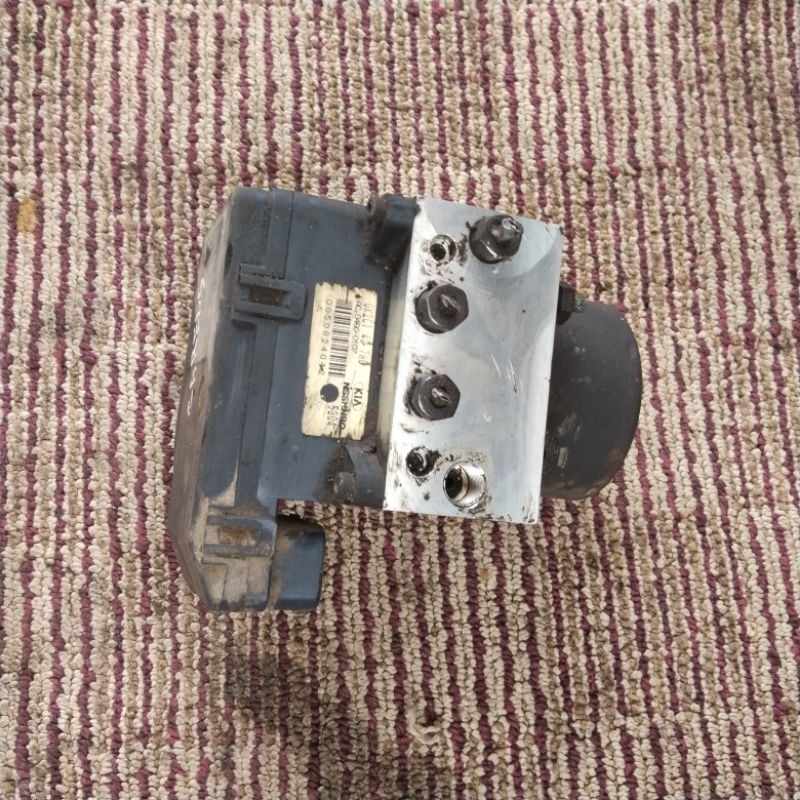 abs kia carens 1 matic