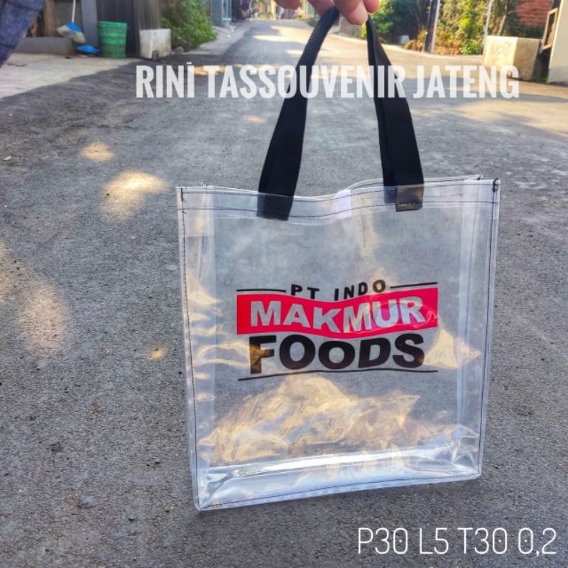 

Tas mika 0,20 sablon 1 warna pegangan bisban ukuran custom