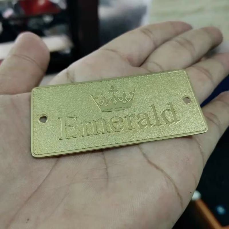 

Label tas stainless kuningan