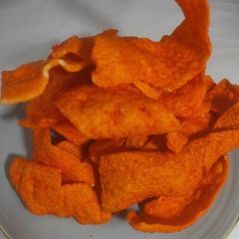 

KERIPIK SLONDOK SINGKONG GARING PEDAS MANIS / SLONDOK PEDAS / KEMASAN SACHET 100 GR