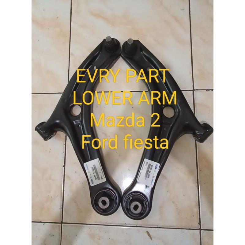 lower arm Assy Mazda 2 lower  fista