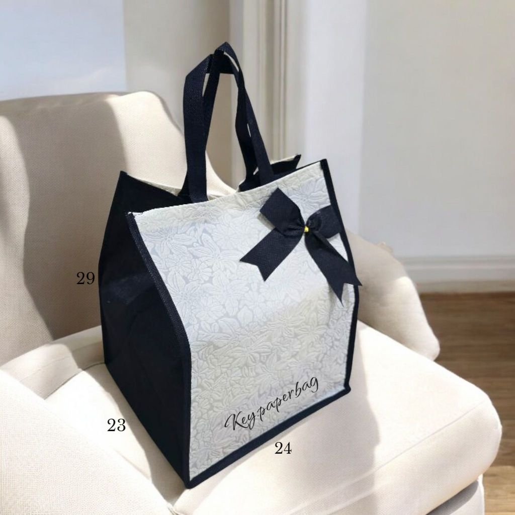 

ISI 12 (1 Lusin) Tas Kain Hajatan Embos Bunga