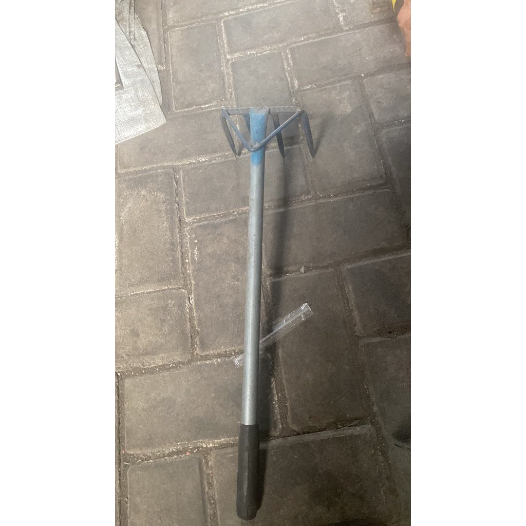 garukan rumput garukan sampah