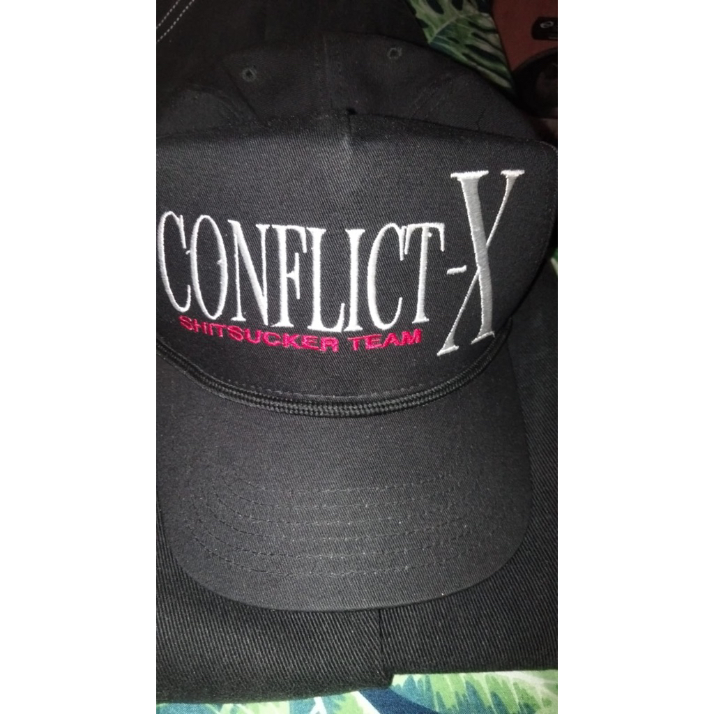 topi conflict x