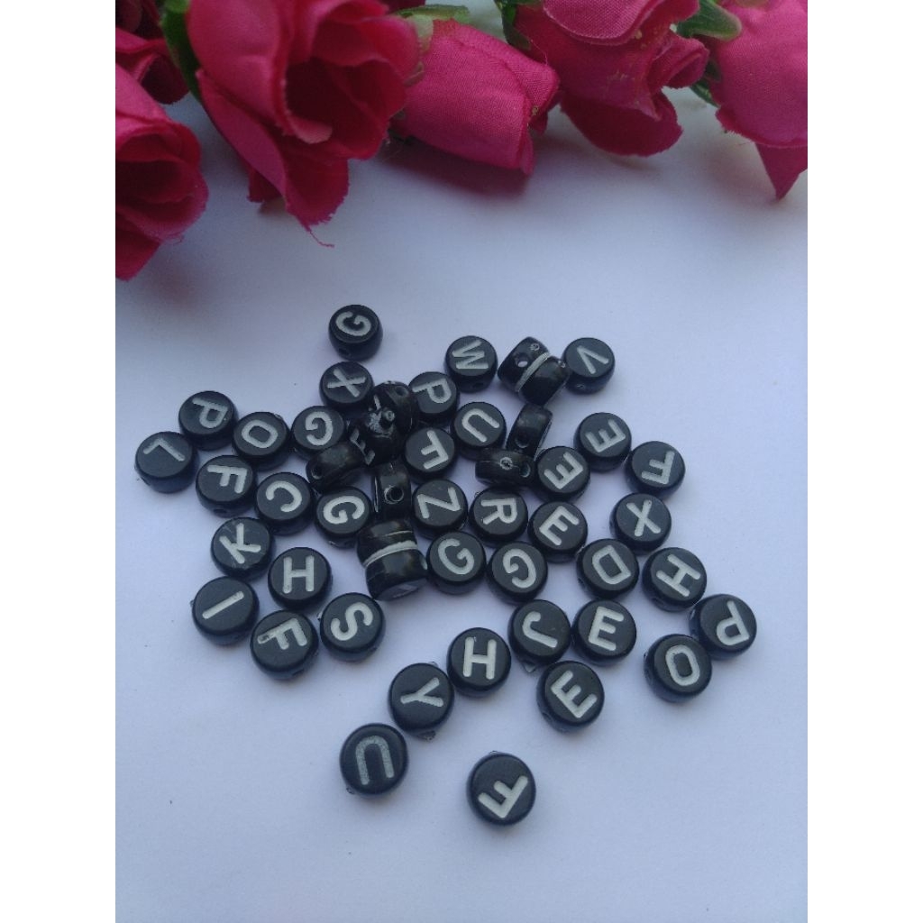 manik manik huruf bulat