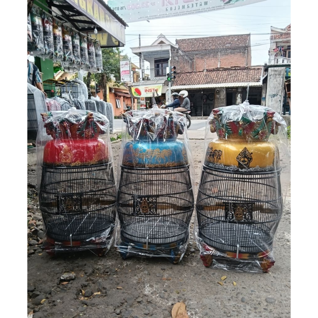 SANGKAR PERKUTUT FIBER KATESAN MAHKOTA MERAK