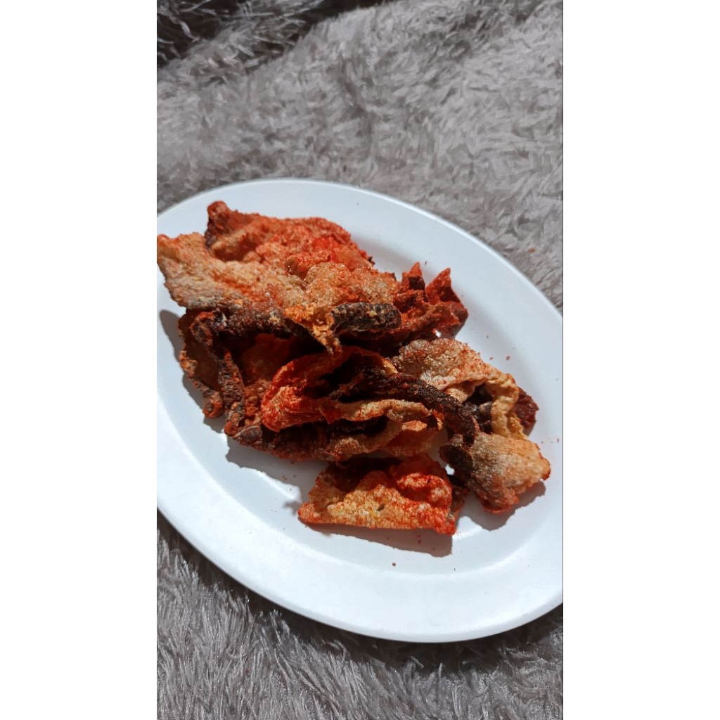 

Keripik Kulit Ikan Patin Mercon Level 1-5 100gr