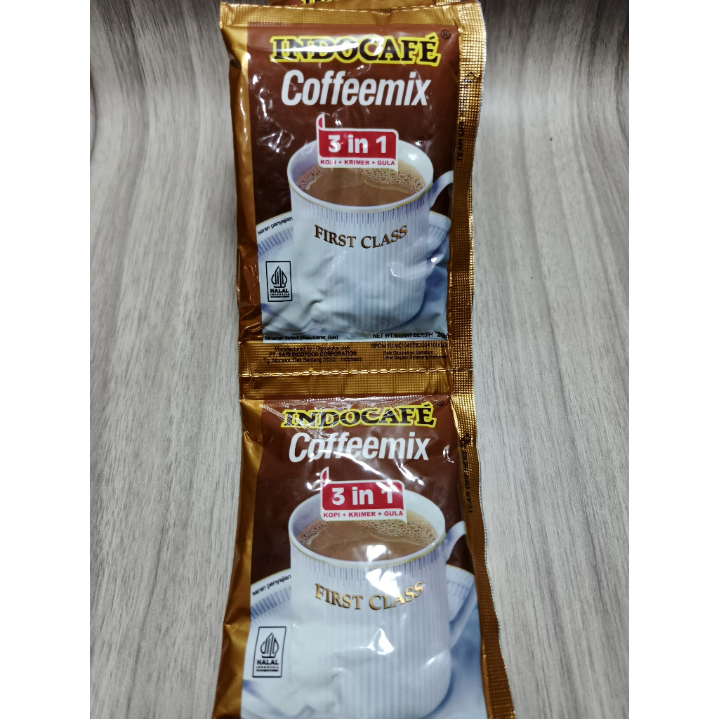 

Indocafe Coffeemix Kopi + Kerimur Gula First Class 1renteng isi 10sachet