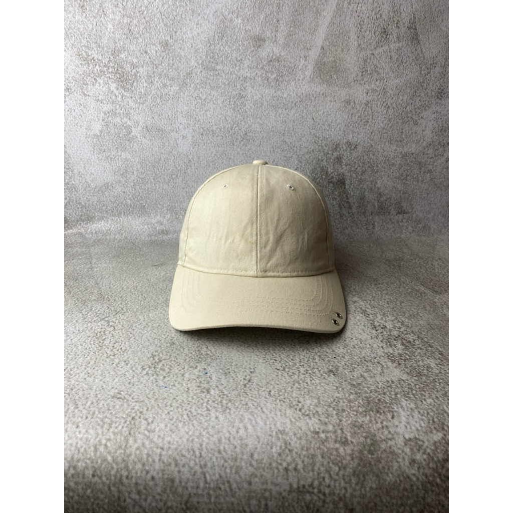 Topi Keith Haring cream