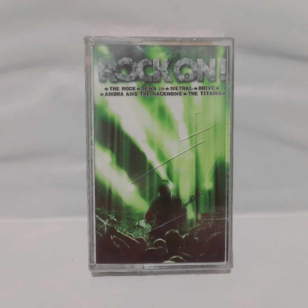Kaset Rock On  - The Rock Dewa Netral Drive The Titans (Segel)