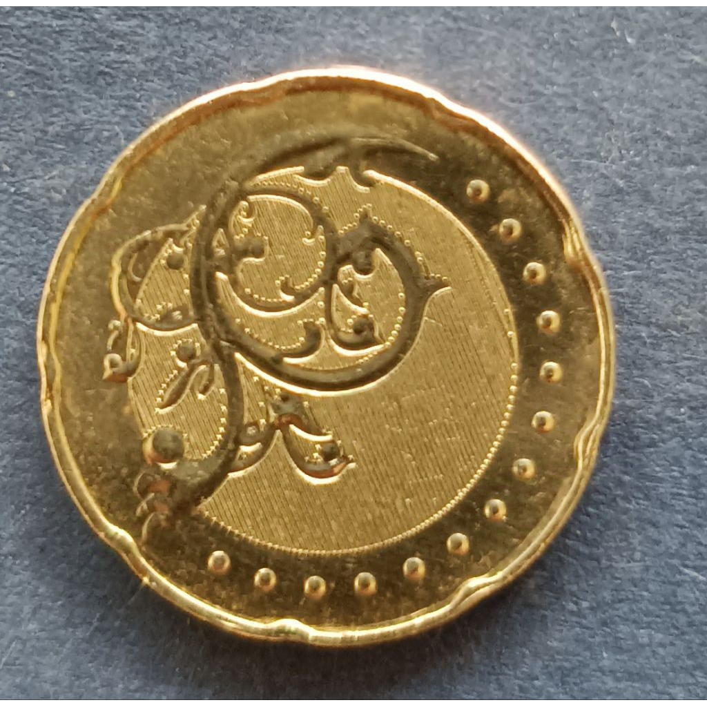 koin Malaysia 50 cent (kuning) tahun 2014..