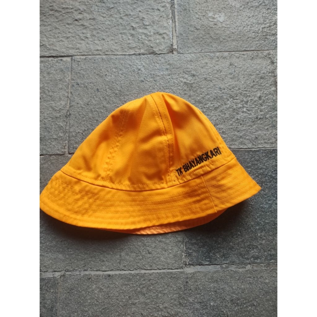 Topi TK Bhayangkari warna Oranye Perempuan Bundar