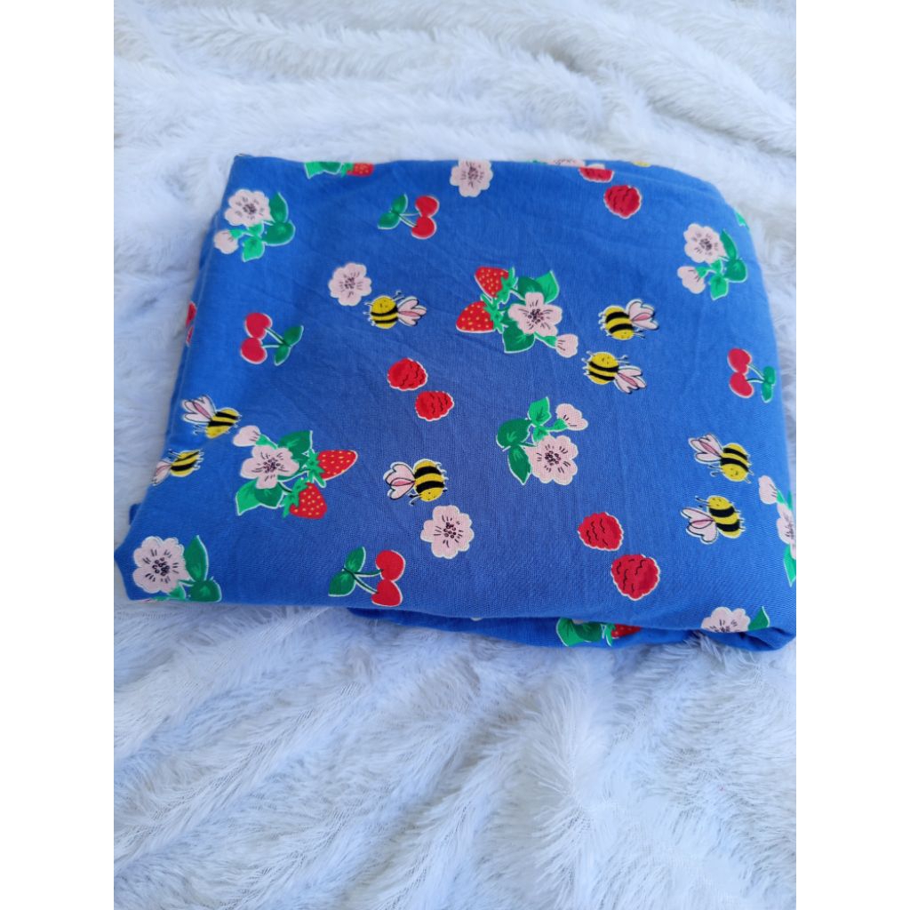 kain kaos motif kiloan