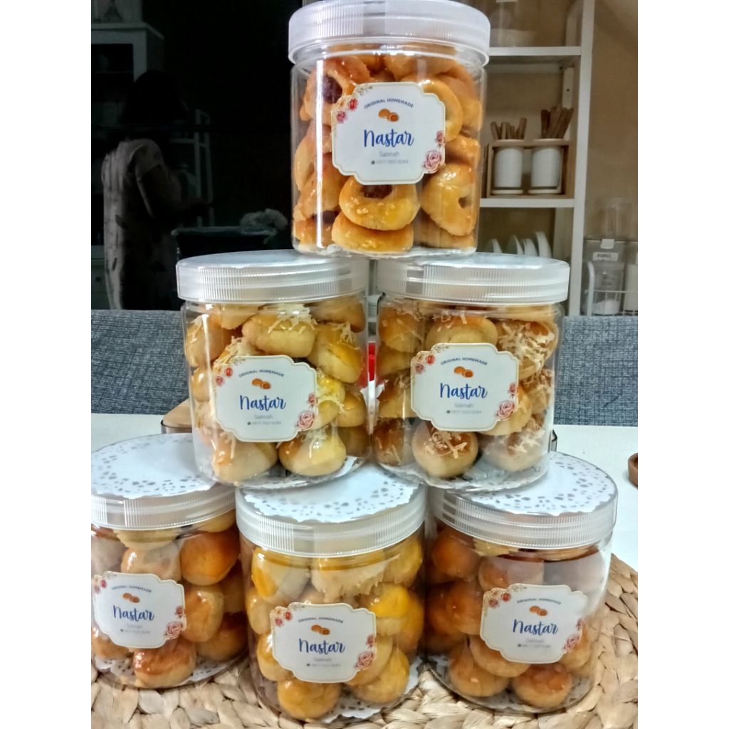 

KUE NASTAR PREMIUM DENGAN BUAH NANAS DAN GULA ASLI TANPA BAHAN PENGAWET DIKEMAS DENGAN TOPLES TABUNG 600ml dan 500ml