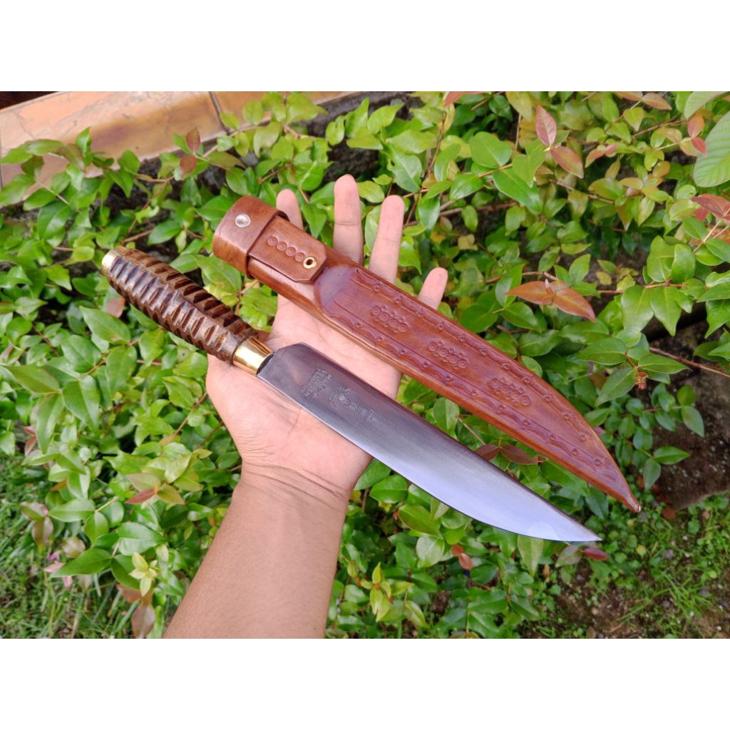 pisau cap garpu tribal