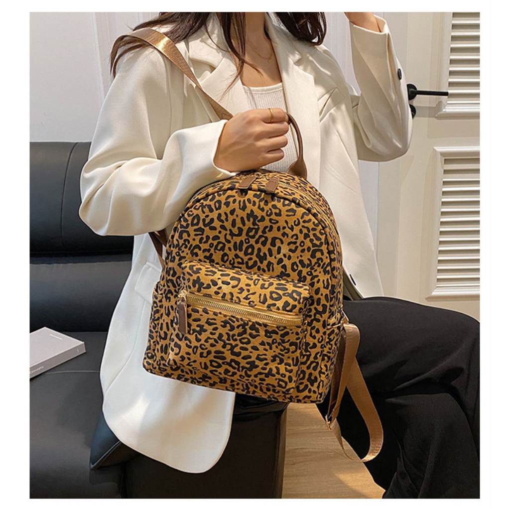 tas rensel motif macan tutul wanita