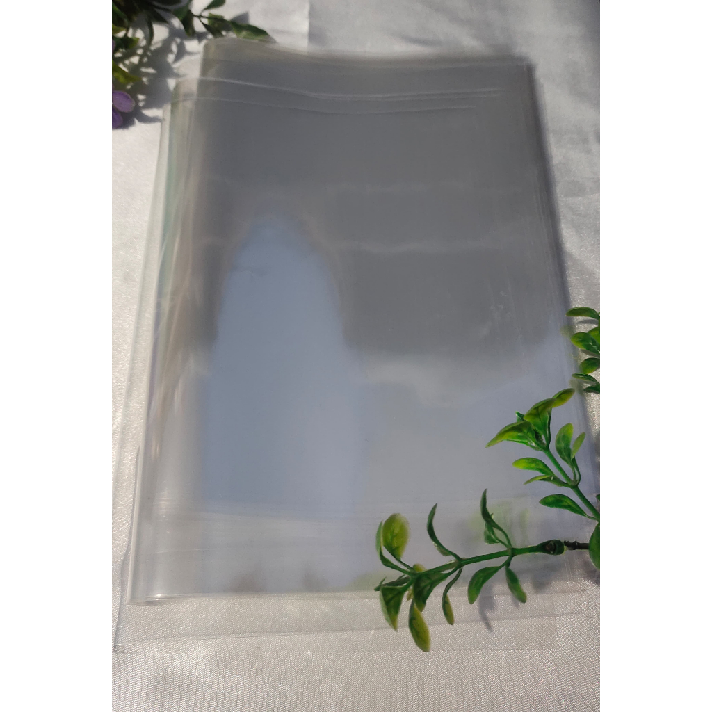 PLASTIK OPP KACA TANPA LEM LEBAR 3 - 9 / 100GRAM PLASTIK OPP KACA TANPA LEM/PLASTIK PLASTIK BENING T