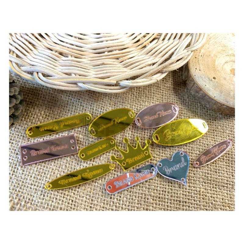 

label akrilik minimal pemesanan 300pcs label baju label akrilik