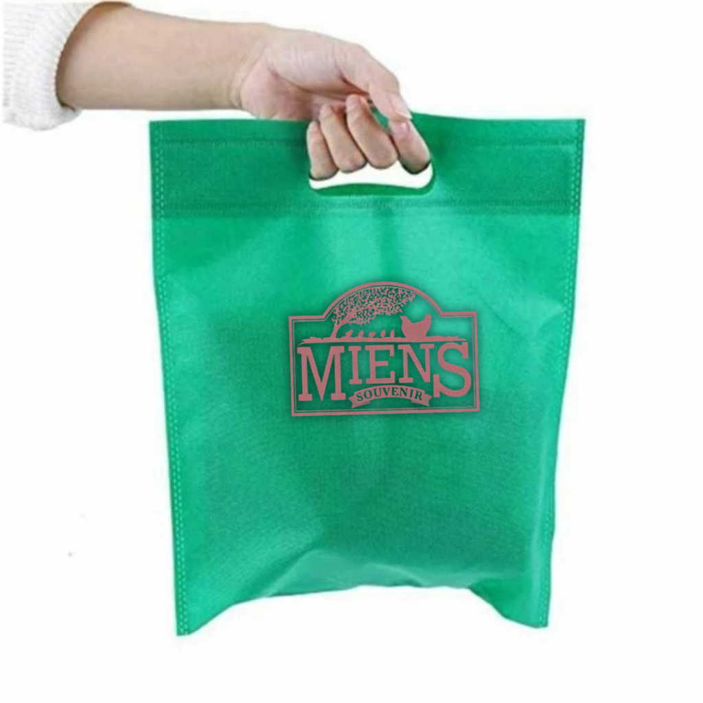 

MIENS SOUVENIR Goodie Bag Spunbond Oval 20x26 cm Tas Press Kain Plong Cut