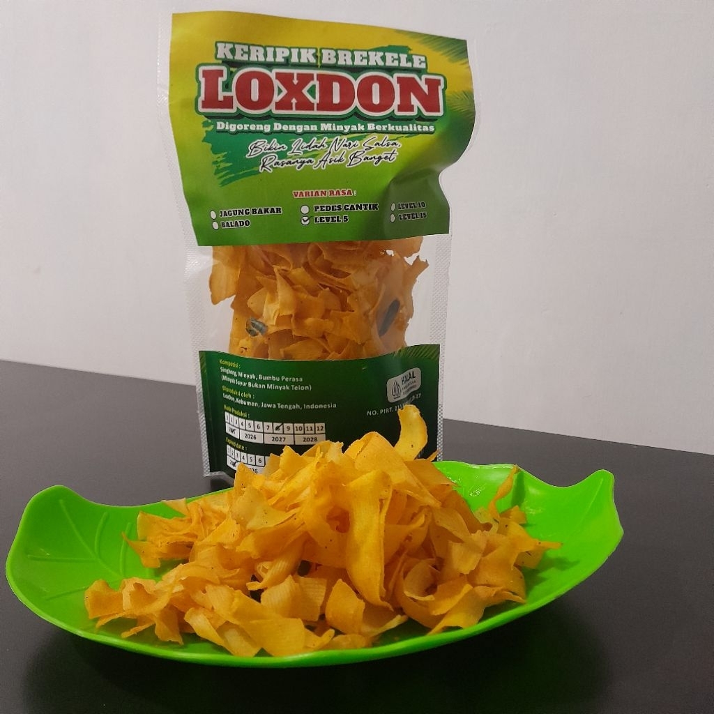 

Keripik singkong brekele pedas daun jeruk level 5 beli 3 produk dapat logam mulia