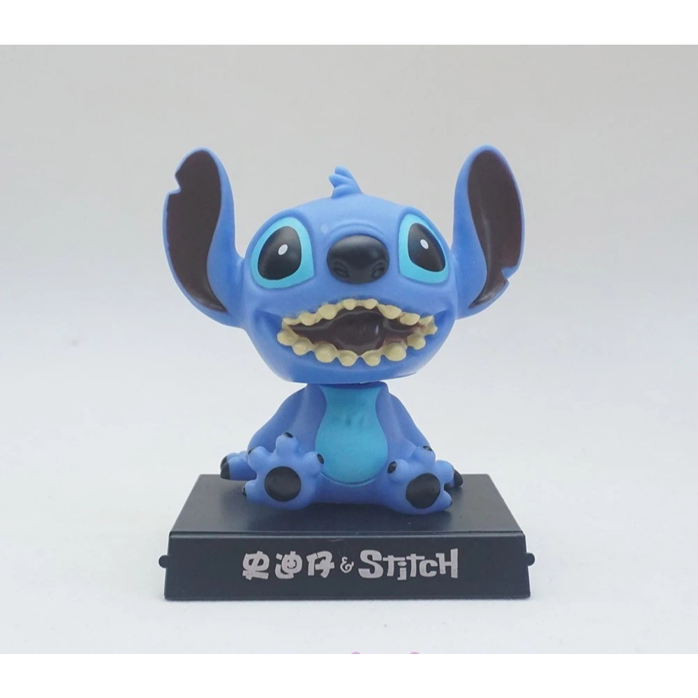 Kepala Goyang & Penyangga HP / Bobble Head & Phone Holder Ukuran : Tinggi 11.5cm, Panjang 9cm, Lebar