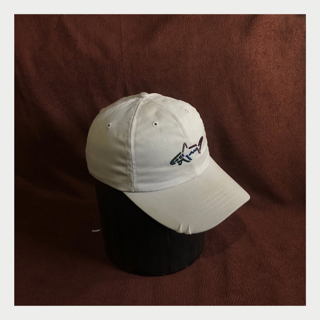 Topi Greg Norman