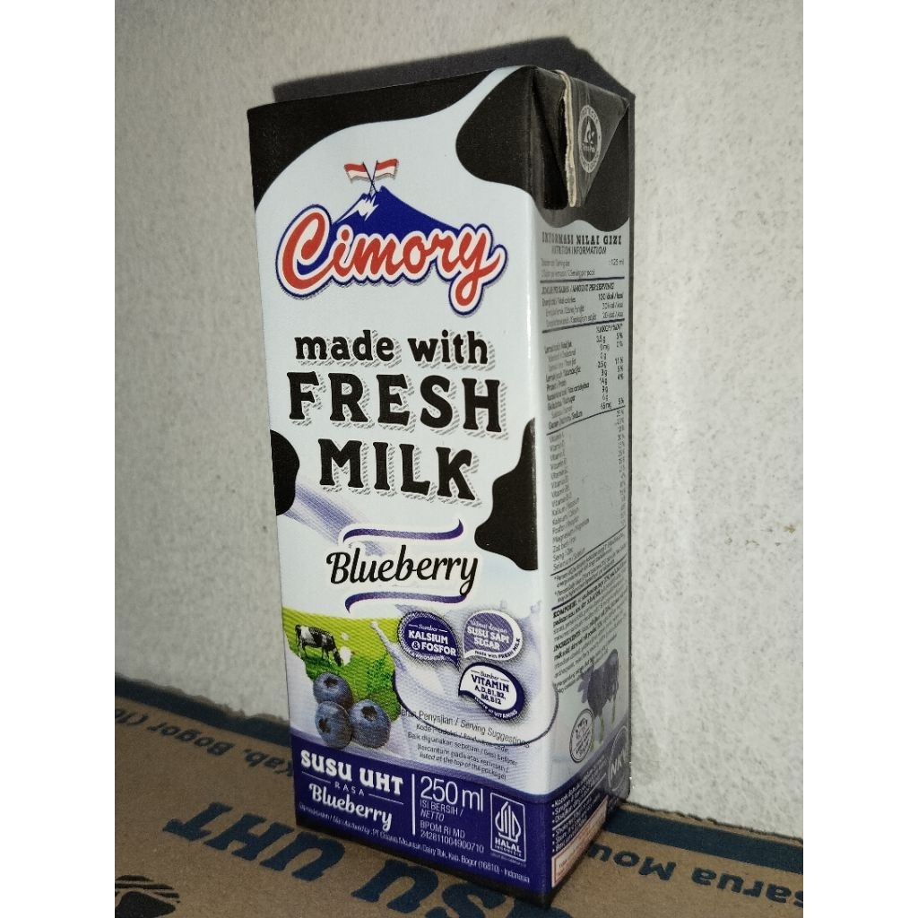 

Cimory susu UHT 250ml rasa blueberry