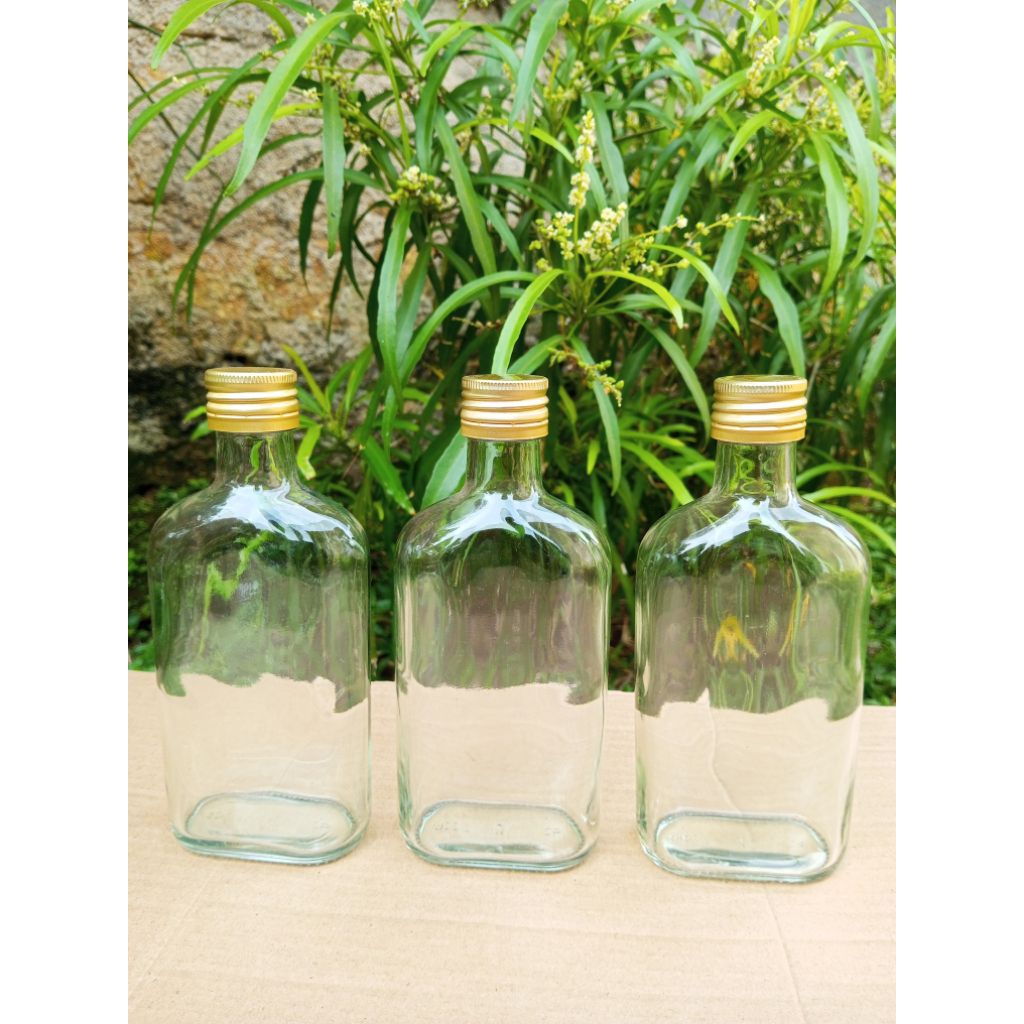 botol kaca gepeng bening 250ml / botol kaca bening 250ml tutup seng gold / botol kaca gepeng 250ml