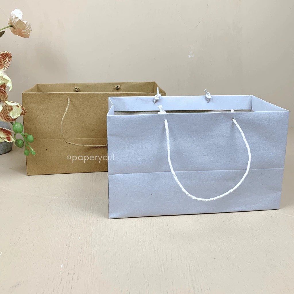 

Paperbag Tas Kertas Kraft Warna Motif Goodie Bag 23 x 12 x 13 cm