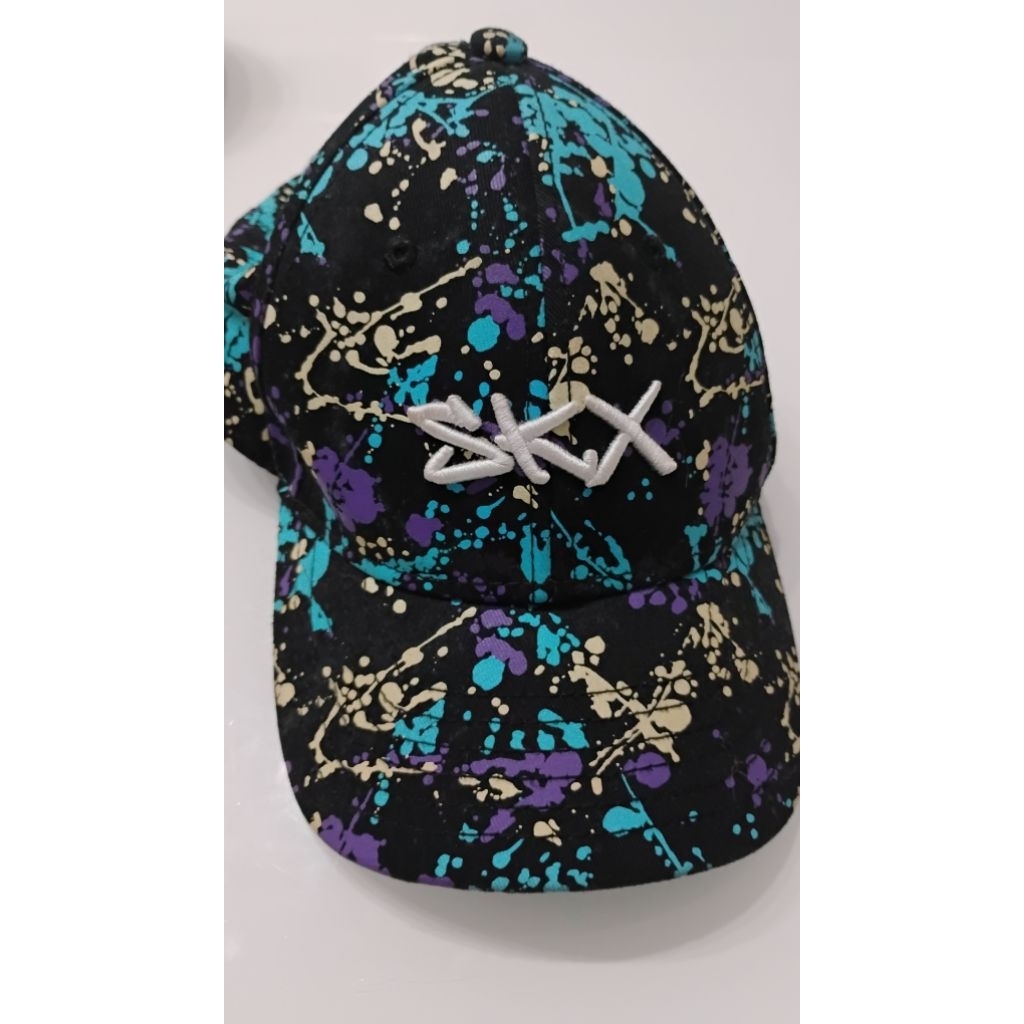 topi skechers prelove