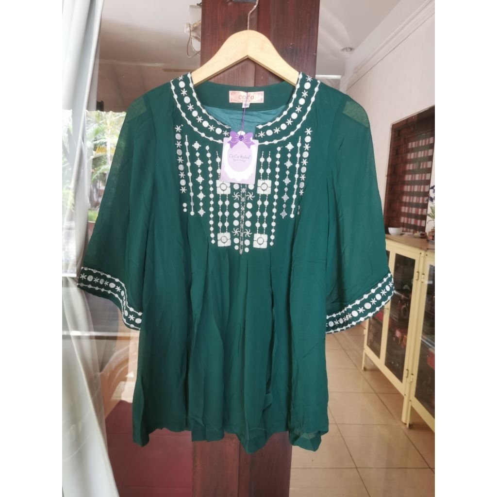 Atasan Cocokelen warna hijau botol