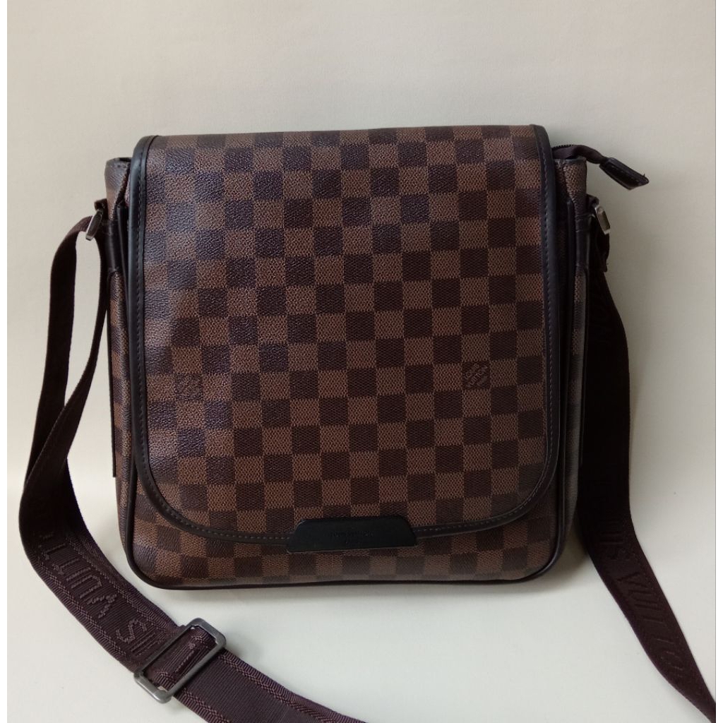 TAS KULIT COWOK SELEMPANG MOTIF