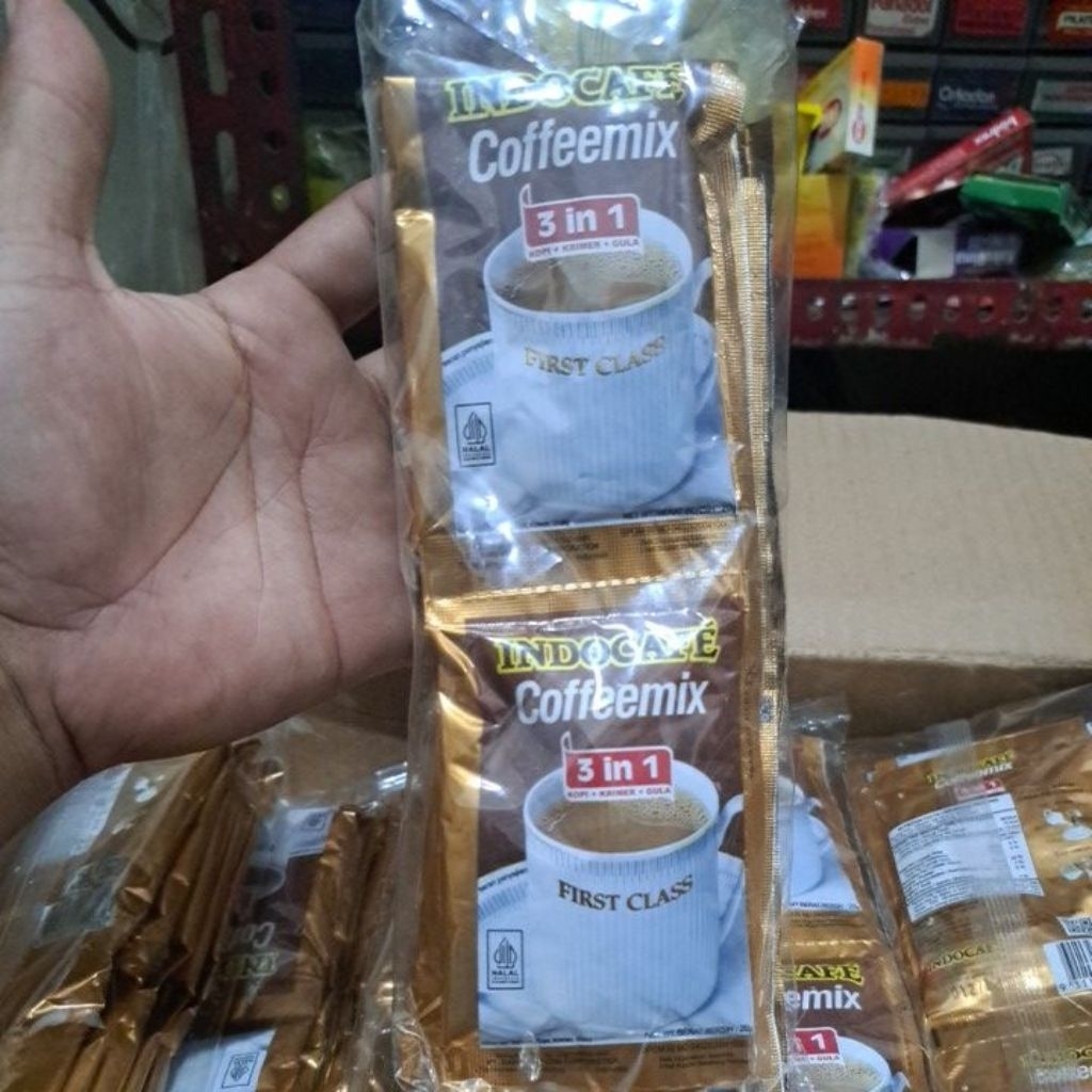 

indocafe coffieemix 3 in 1 kopi+ krimer +gula 1pack isi 10pcs