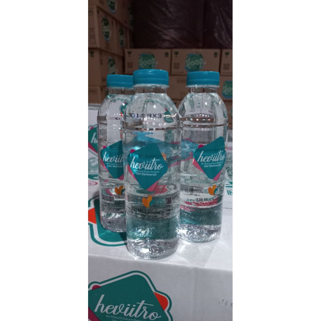 

Air minum merk HEVIITRO kemasan botol 330 ml per karton isi 24 botol
