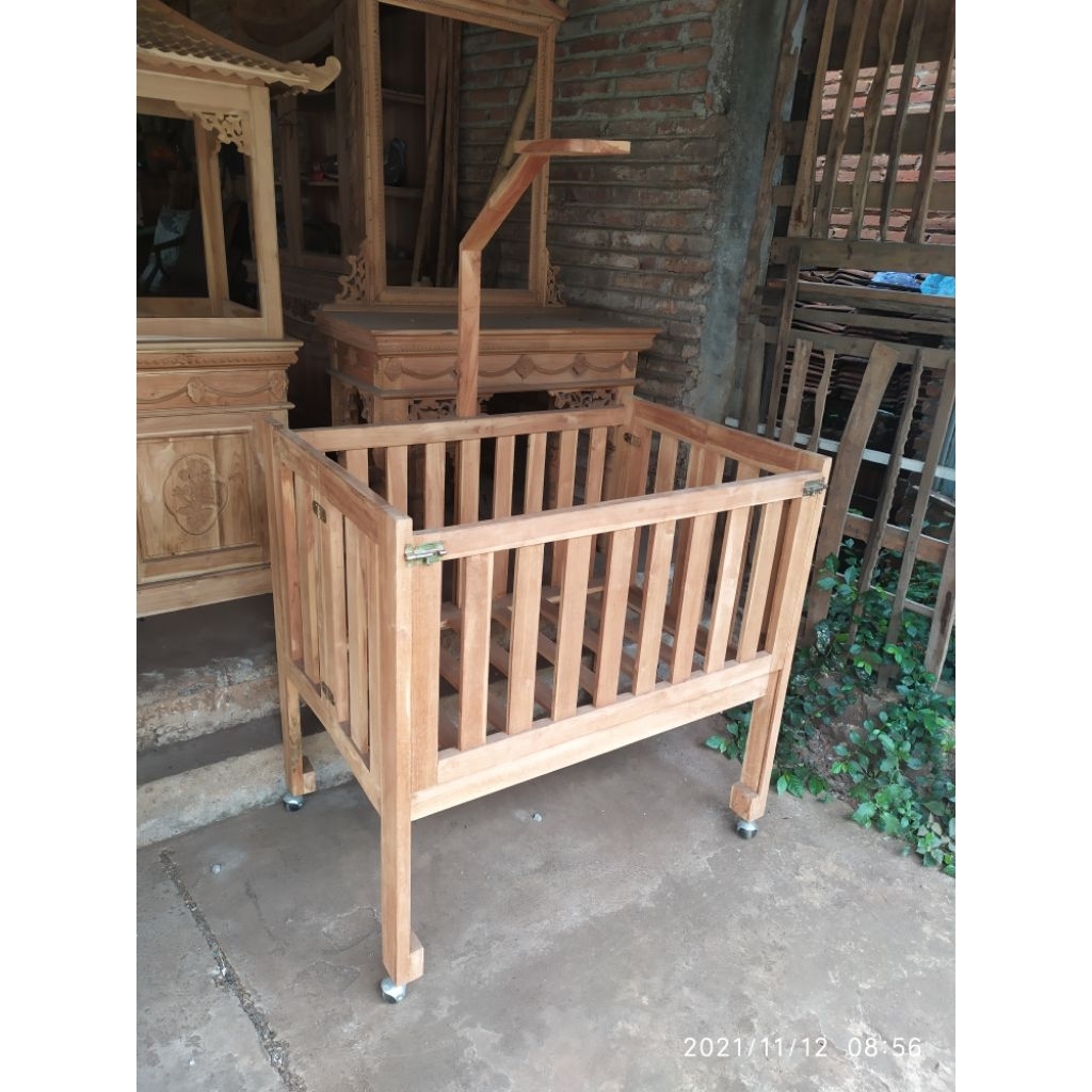 Tempat tidur bayi lipat kayu jati solid box bayi roda