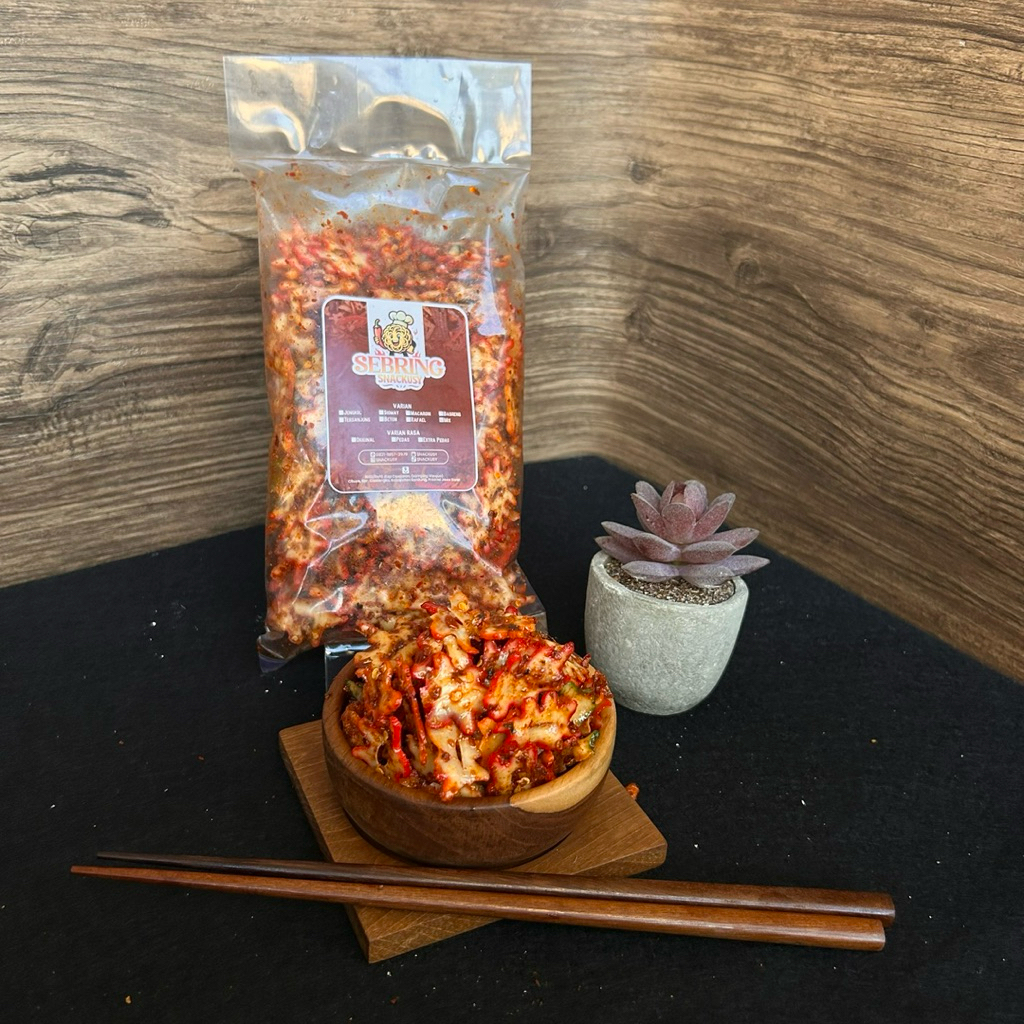 

KERUPUK SEBLAK KERING (SEBRING) - TERSANJUNG CHILI OIL DAUN JERUK EXTRA PEDAS 180 GRM