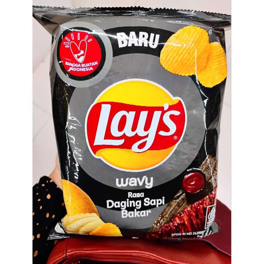 

Lay's Keripik Kentang Rasa Daging Sapi Bakar/Ayam Goreng Bawang/Saus Pedas Manis/Rumput Laut 64Gr
