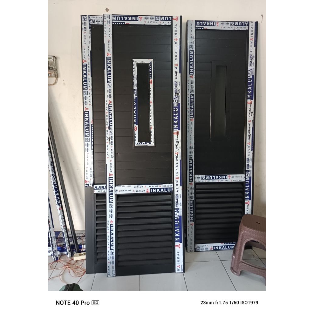 DAUN PINTU GARASI ALUMINIUM MOTIF JALUSI